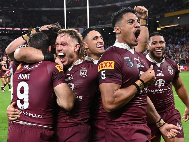 BRISBANE, AUSTRALIA - JUNE 21: Murray Taulagi and Reuben Cotter of the Maroons celebrate victory following game two of the State of Origin series between the Queensland Maroons and the New South Wales Blues at Suncorp Stadium on June 21, 2023 in Brisbane, Australia. (Photo by Bradley Kanaris/Getty Images)