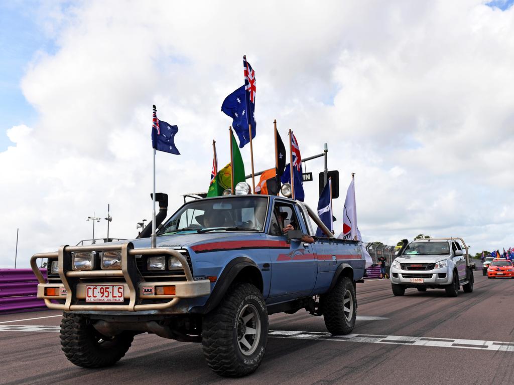 And they're off. Dozens of utes hit the road at Hidden Valley for the annual Variety NT Australia Day Ute run. Picture: Che Chorley