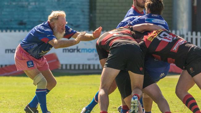 Manly Marlins stalwart Rusty Mackie (left) in action against Northern Suburbs on Saturday. Picture: Adam MacDonald