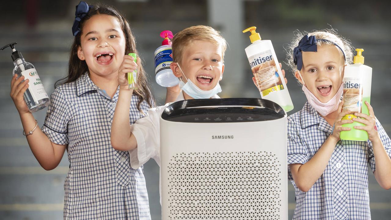 Students at St John Vianney primary school students in their classroom with an air purifier received in early 2022 .Picture: Rob Leeson.