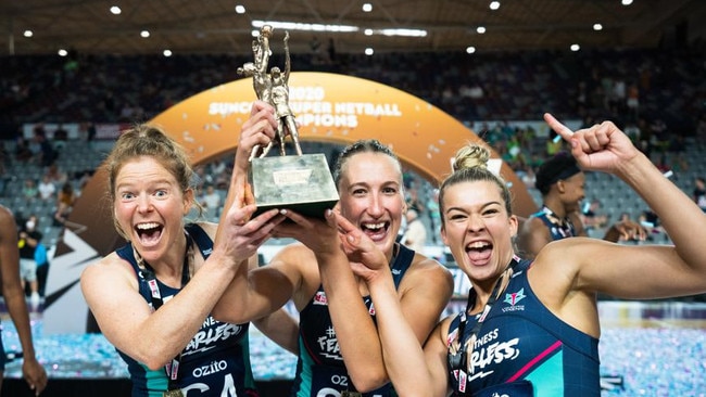 Tegan Philip, Emily Mannix and Allie Smith celebrate Melbourne Vixens title in 2020.