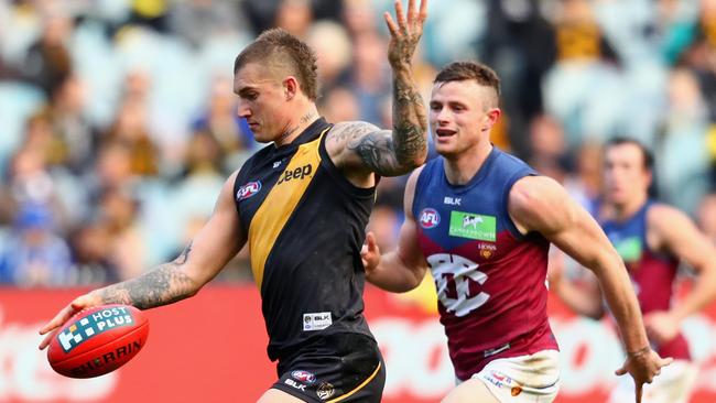 Dustin Martin escapes for Richmond against Brisbane. Picture: Quinn Rooney (Getty Images)