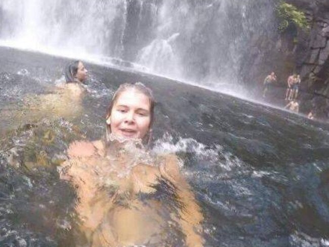 Anneka Bading was swimming at a Grampians waterfall on Saturday when a man who was part of the group pictured behind her fell into the water and drowned. Picture: Anneke Bading/Facebook.