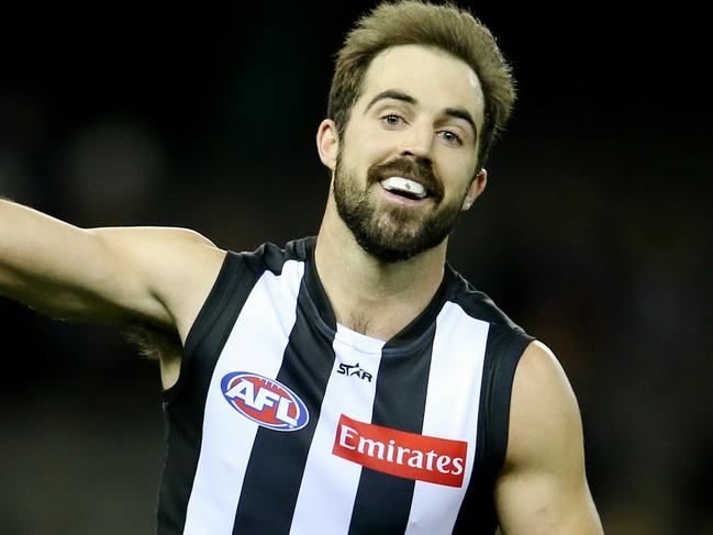 AFL Round 22. Collingwood v Gold Coast Suns at Etihad Stadium. Steele Sidebottom celebrates 1st qtr goal   . Pic: Michael Klein