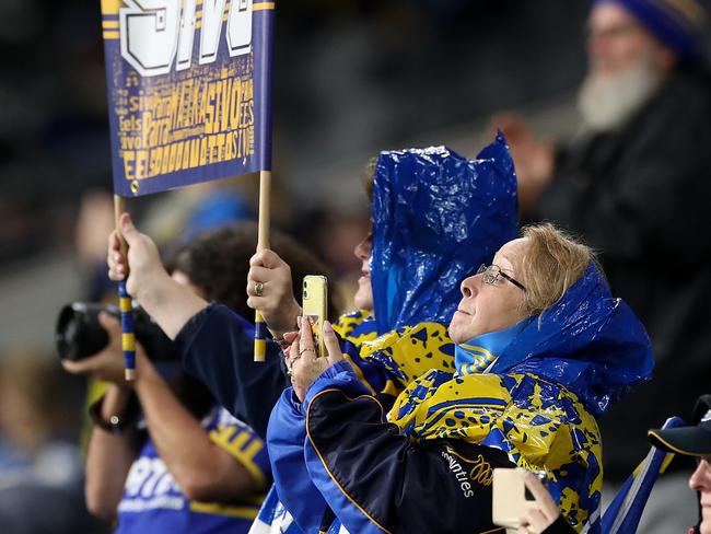 SYDNEY, AUSTRALIA - AUGUST 14:  Eels fans show their support during the round 14 NRL match between the Parramatta Eels and the St George Illawarra Dragons at Bankwest Stadium on August 14, 2020 in Sydney, Australia. (Photo by Mark Kolbe/Getty Images)