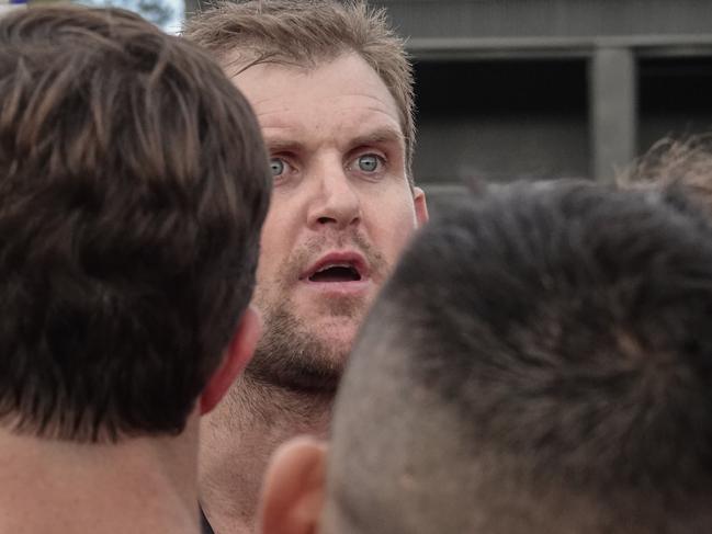 Eltham coach Tim Bongetti addresses his players. Picture: Valeriu Campan