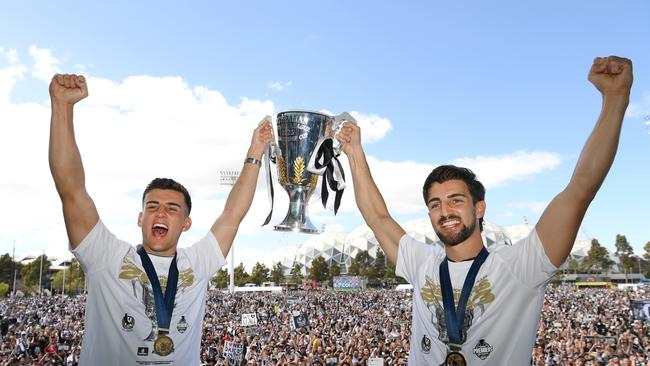 Nick Daicos and Josh Daicos hold up the Premiership Cup during Grand Final celebrations fan day at AIA Centre. Picture: Quinn Rooney/Getty Images.