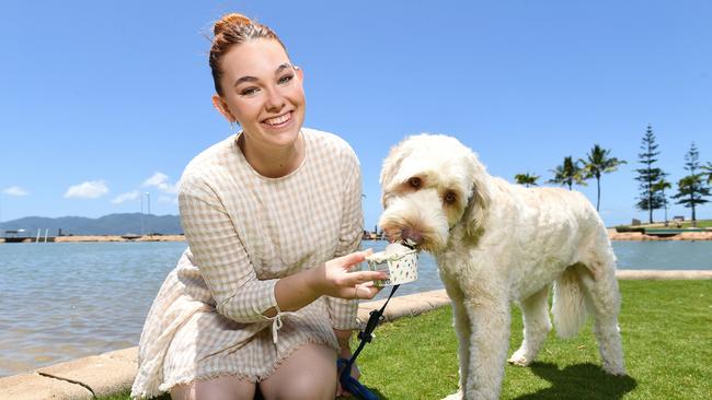 Best of 2022. Rockpool Pavilion Venue Manager Tayla Hancock treats 1yo cobber dog, Cyril, to some Doggie Ice cream which they now stock. Picture: Shae Beplate.