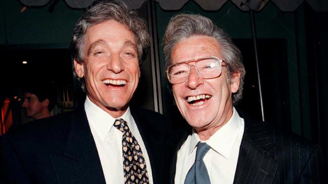 Lookalikes: Steve Dunleavy, right, with his lookalike — American TV personality Maury Povich — in 1998. Picture: Supplied