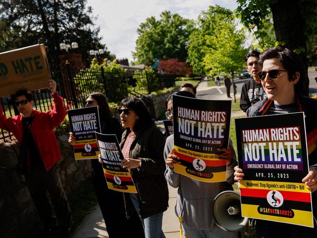 WASHINGTON DC - APRIL 25: Activists protest outside the Ugandan Embassy over Uganda's parliamentary Anti-Homosexuality Bill, 2023 on April 25, 2023 in Washington, DC. LGBTQIA+ rights activists are taking part in a day of action across the United States to call on Ugandan President Yoweri Museveni to stop the bill, which passed on March 21, from going forward.   Anna Moneymaker/Getty Images/AFP (Photo by Anna Moneymaker / GETTY IMAGES NORTH AMERICA / Getty Images via AFP)