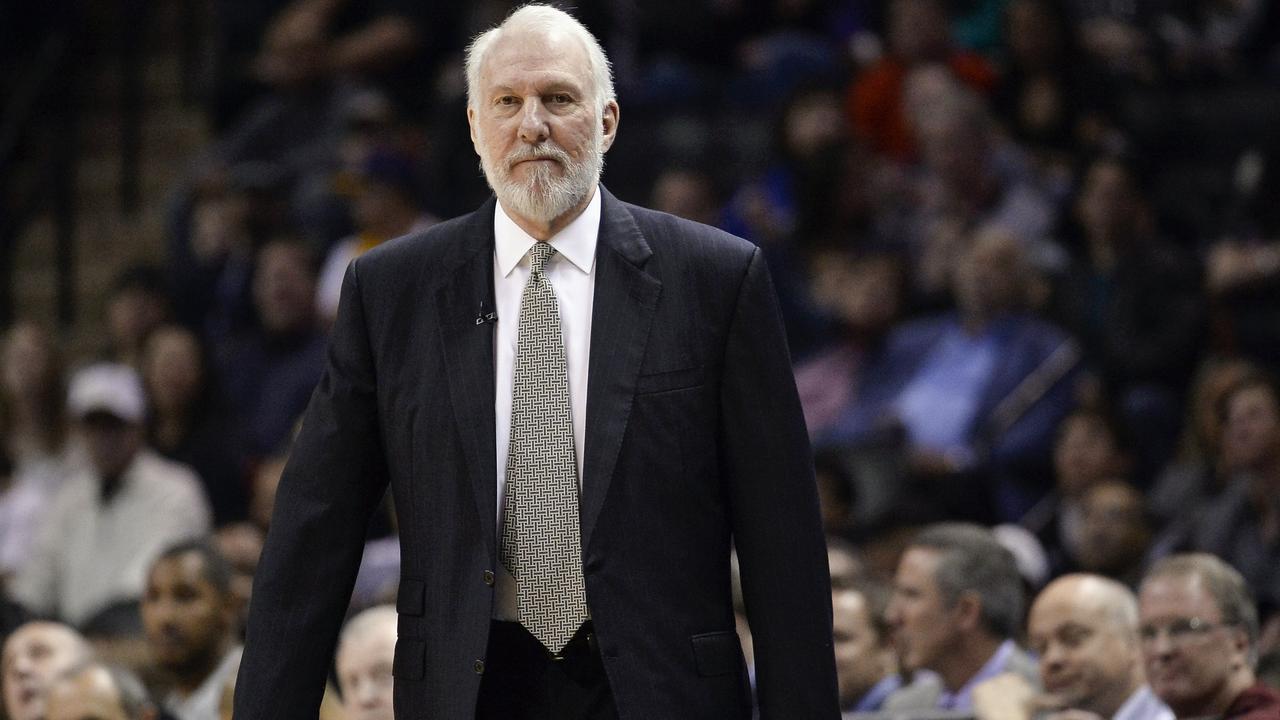 FILE - This is a March 8, 2015, file photo showing San Antonio Spurs head coach Gregg Popovich watching play during the first half of an NBA basketball game against the Chicago Bulls in San Antonio. Popovich, who has led the San Antonio Spurs to five NBA titles, will replace Mike Krzyzewski as the U.S. basketball coach following the 2016 Olympics. (AP Photo/Darren Abate, File)