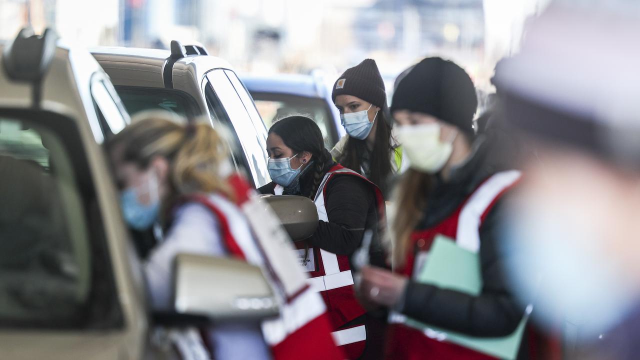 Healthcare workers in Denver administer COVID-19 vaccines in a drive-through centre. Picture: Michael Ciaglo/Getty Images/AFP