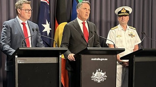 Defence Industry Minister Pat Conroy, Deputy Prime Minister and Defence Minister Richard Marles, and Vice Admiral Jonathan Mead, Chief Nuclear Powered Submarine Task Force. Picture: Charles Miranda