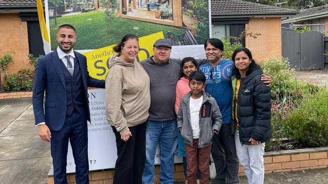 Ray White Oakleigh agent James Rasool, the vendors, and the buyers of 19 Murumba Drive, Oakleigh South.