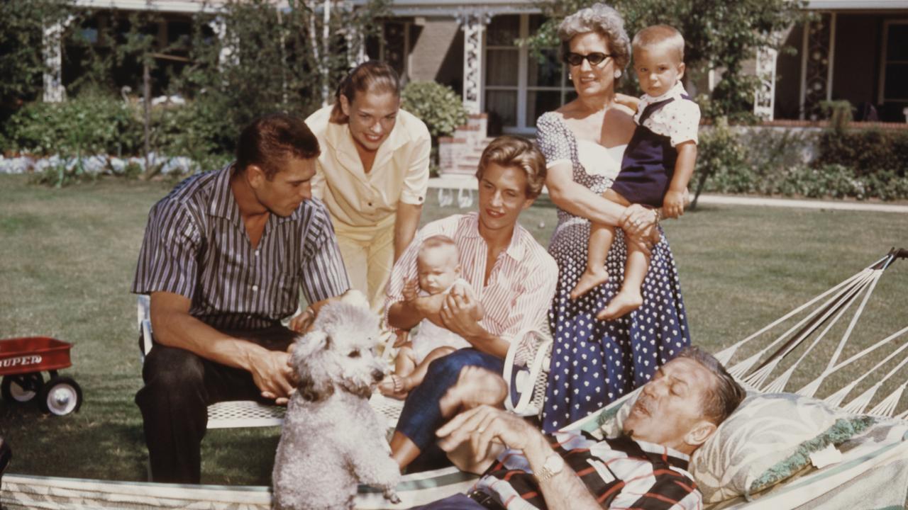 In this 1950s happy snap, animator Walt Disney is pictured with his wife Lillian (left), daughters Sharon and Diane and other family members. Picture: Gene Lester/Getty Images