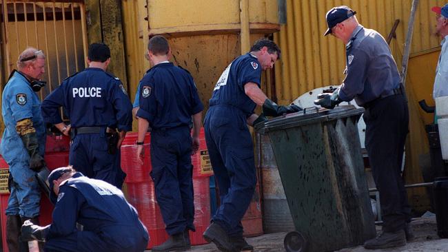 Police and fire officers searching Wentworth Radiators after discovering Podgoyetsky in acidbath in a wheelie bin.