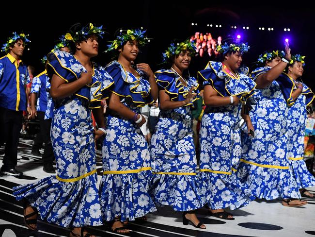 Members of the Nauru delegation take part in the opening ceremony