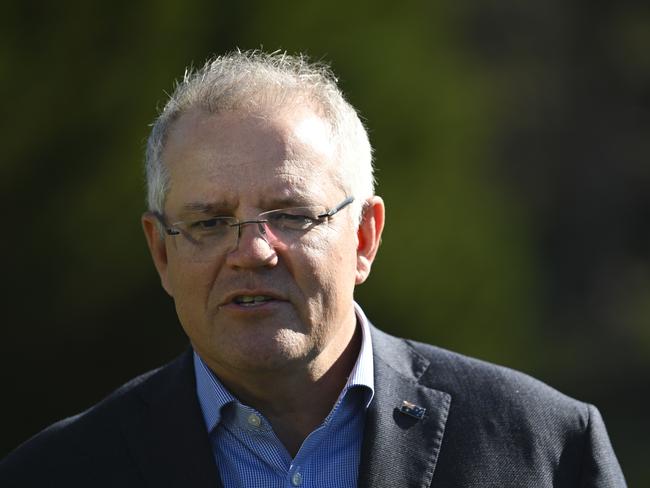 Australian Prime Minister Scott Morrison speaks to the media during a visit to Robyn Rowe Chocolates with the Liberal candidate for the seat of Eden-Monaro Fiona Kotvojs in Murrumbateman near Canberra, Sunday, May 24, 2020. (AAP Image/Lukas Coch) NO ARCHIVING