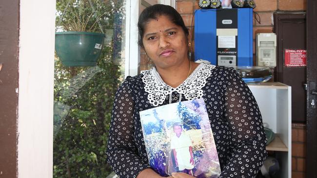 Shyamalie Sashikumar with a picture of her son Isuru who she hasn't seen for 13 years. Picture: Alan Barber