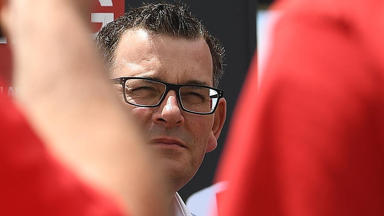 Premier Daniel Andrews with Labor Party supporters wearing red shirts. Picture: AAP