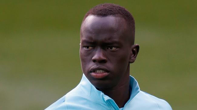 Socceroo Awer Mabil says he regularly faced racism growing up in Adelaide