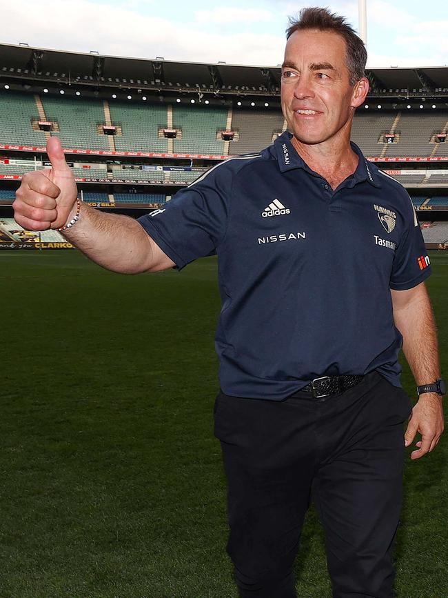 Walking off the MCG in his final game as Hawthorn coach.