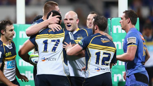 PERTH, AUSTRALIA - JUNE 05: (L-R) Nic White, Rory Arnold, Stephen Moore and Robbie Coleman of the Brumbies is congratulate Allan Alaalatoa of the Brumbies after he scored a try during the round 17 Super Rugby match between the Western Force and the Brumbies at nib Stadium on June 5, 2015 in Perth, Australia. (Photo by Mark Kolbe/Getty Images)