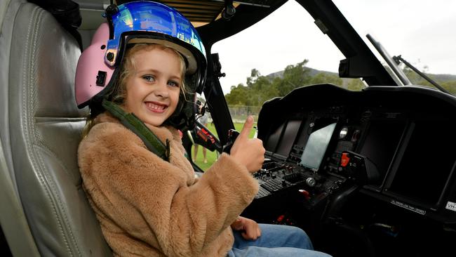 5th Aviation with Penelope Paterson, 6, sits at the controls of a Augusta Westland AW139 helicopter from 5th Aviation. Picture: Evan Morgan