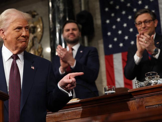 US Vice President JD Vance and Speaker of the House Mike Johnson applaud as US President Donald Trump speaks. Picture: AFP