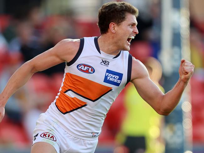 AFL Round 9. Gold Coast Suns vs GWS Giants at Metricon Stadium, Gold Coast.  02/08/2020.  Jacob Hopper of the Giants celebrates his goal in the second quarter    . Pic: Michael Klein