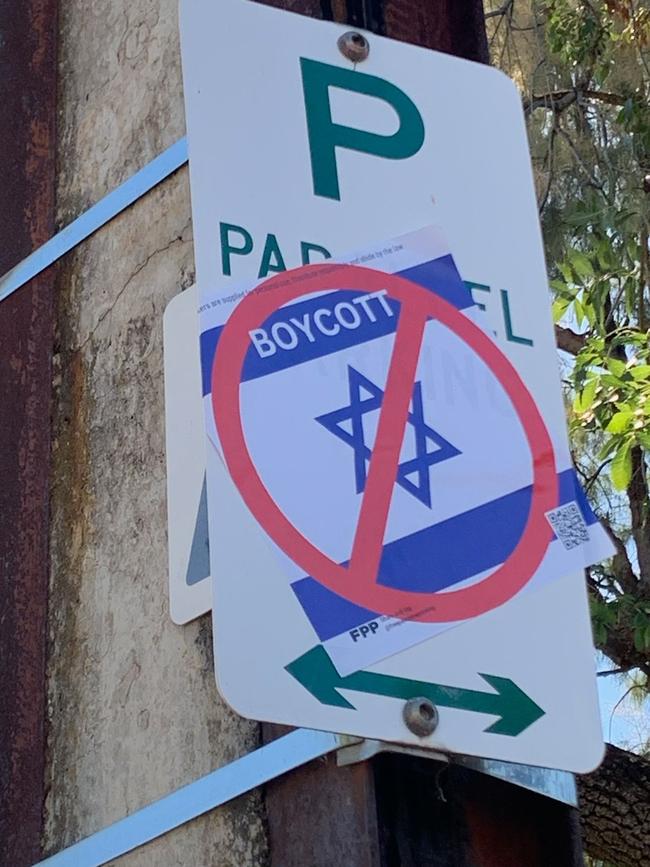 Anti-Israel posters have been placed outside a polling booth on the day of the Dunstan by-election. Picture: Supplied