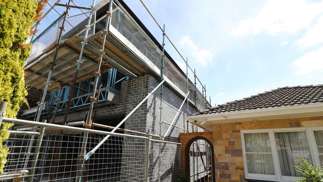 A new house, one of two being built on a subdivided block next to an existing 1960s era house at Hectorville. Picture: Tait Schmaal