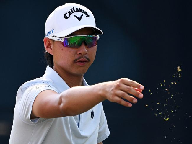 PINEHURST, NORTH CAROLINA - JUNE 14: Min Woo Lee of Australia checks the breeze on the fourth tee during the second round of the 124th U.S. Open at Pinehurst Resort on June 14, 2024 in Pinehurst, North Carolina.   Ross Kinnaird/Getty Images/AFP (Photo by ROSS KINNAIRD / GETTY IMAGES NORTH AMERICA / Getty Images via AFP)