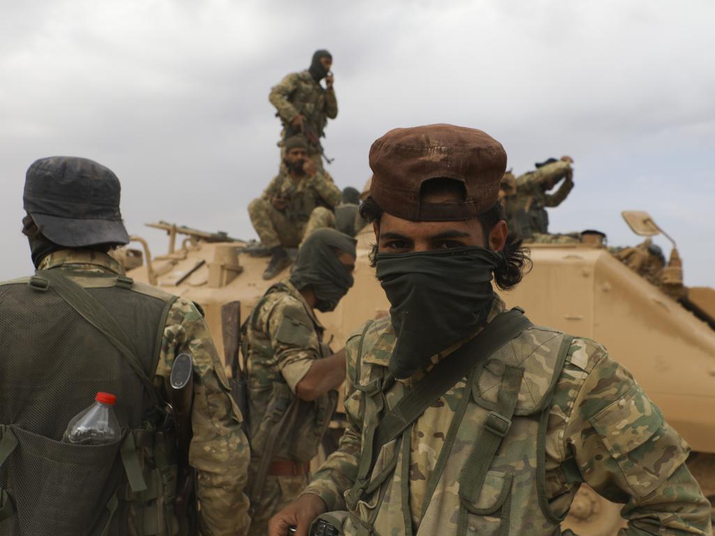 Turkish-backed Syrian opposition fighters deploy near the town of Ras al-Ayn, Syria, Friday, Oct. 19, 2019. Picture: AP Photo