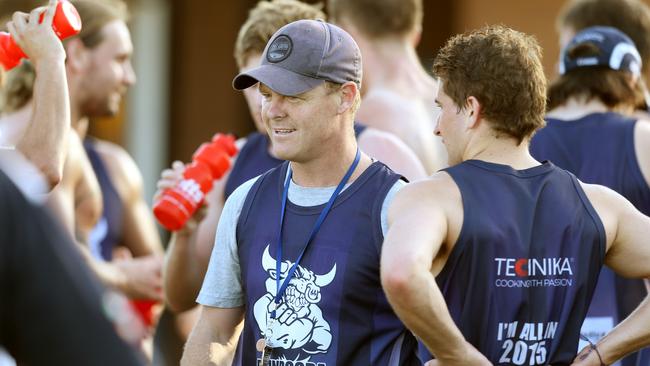 Phil Plunkett takes charge of preseason training during his time with Northern Football League club Bundoora. Picture: Mark Wilson