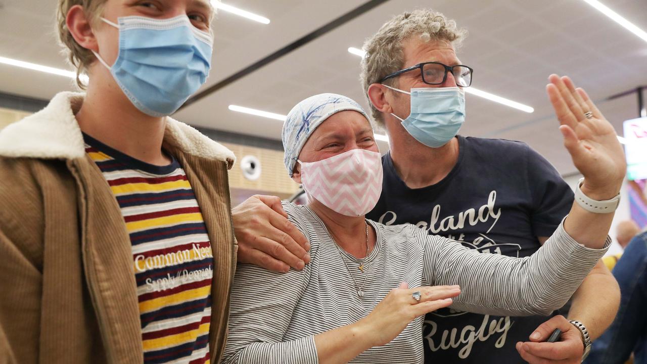 Kate Robertson who has been diagnosed with terminal cancer with son Noah and partner Nic Robertson waiting to meet her parents and two sisters who were arriving from the United Kingdom to see each other after 3 1/2 years. Picture: Nikki Davis-Jones