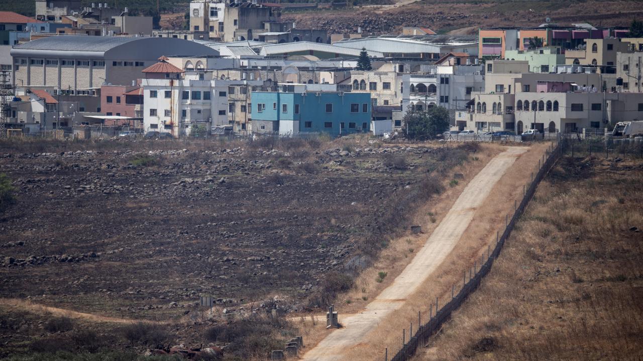 The Blue line dividing Israel and Lebanon, seen looking towards the Lebanese border town of Aadaysit from the base of the United Nations Interim Force in Lebanon. Picture: McGrath/Getty Images