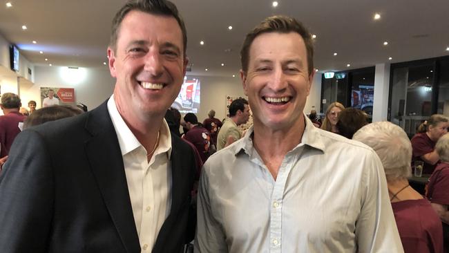 Michael Regan, with friend and supporter Steve Menzies, former Manly Sea Eagles great, flanked by supporters at the Manly Warringah Football Club at Cromer after grabbing the safe seat from the Liberals. Picture: Jim O'Rourke