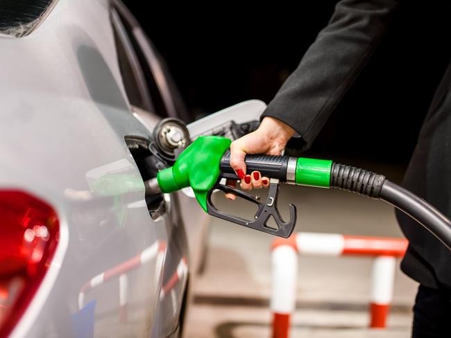 Generic photo - Petrol pump. woman pumping petrol in car at petrol station. Picture: iStock