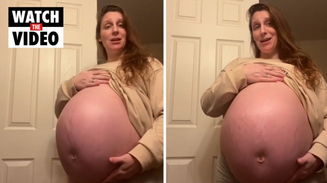 Pregnant girl with huge belly