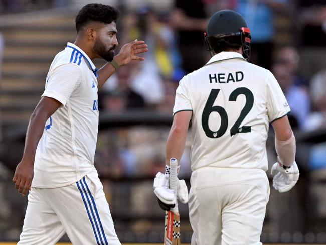 Mohammed Siraj gives Travis Head a send-off. Picture: William WEST/AFP