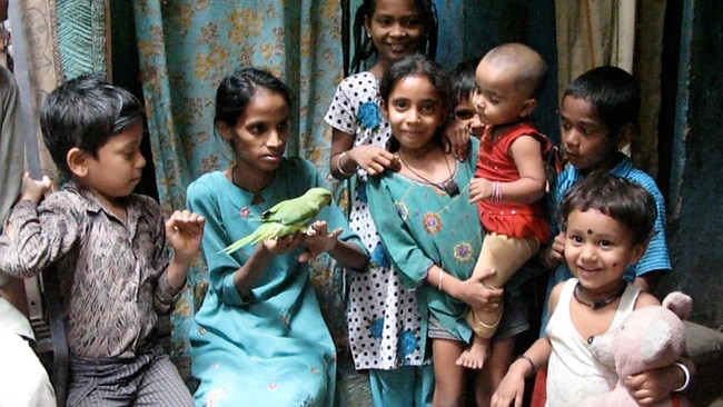 One of the many families that live in Dharavi, one of the largest slums in the world.