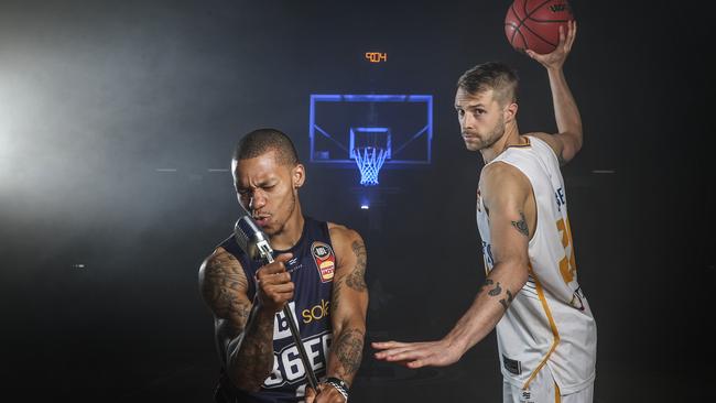 Nathan Sobey and Jerome Randle are getting ready to renew acquaintances when Adelaide hosts Brisbane in the 36ers’ first game at their new home, Adelaide Entertainment Centre. Picture: Sarah Reed. Microphone courtesy of Derringers.