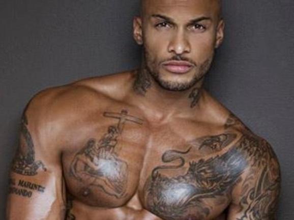 Model David McIntosh is heavily tattooed.