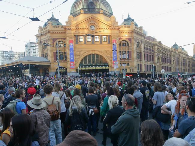 Protestors outside Flinders Street Station during a protest organised by the Warriors of the Aboriginal Resistance against the forced closure of Aborignal communities on Friday, May 1, 2015, in Melbourne, Australia. Picture: Hamish Blair