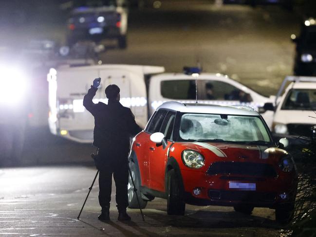 Police allege this red Mini sat ‘for several days’ in an Oatley street as a potential getaway car. Picture: Jonathan Ng