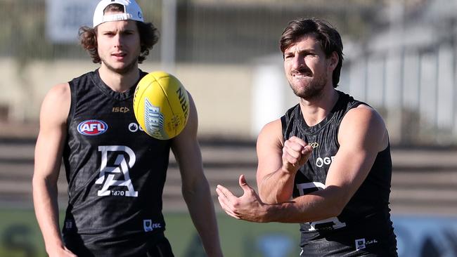 Sam Mayes, right, impressed in his first AFL game since 2018. Picture: Sarah Reed