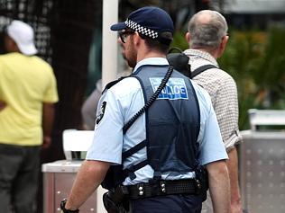 Generic images of Australian Federal Police, Baggage Handlers ? & customs officers at Sydney International Airpo...