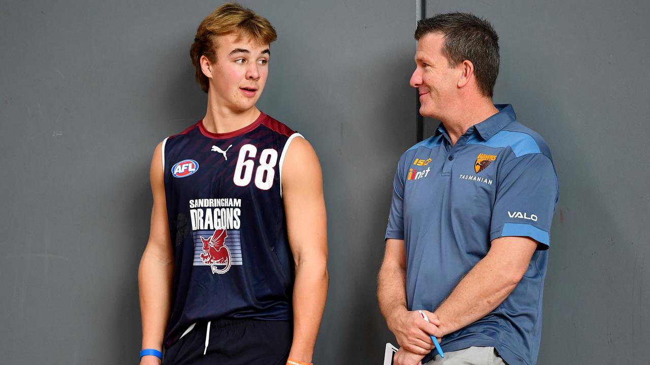 Ryley Sanders chats with with Hawthorn’s Player Acquisition Manager Mark Finnigan. Picture: Getty Images