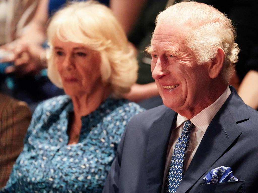 King Charles III (with Queen Camilla) could be seen “giggling” during a play about family betrayal. Picture: AFP